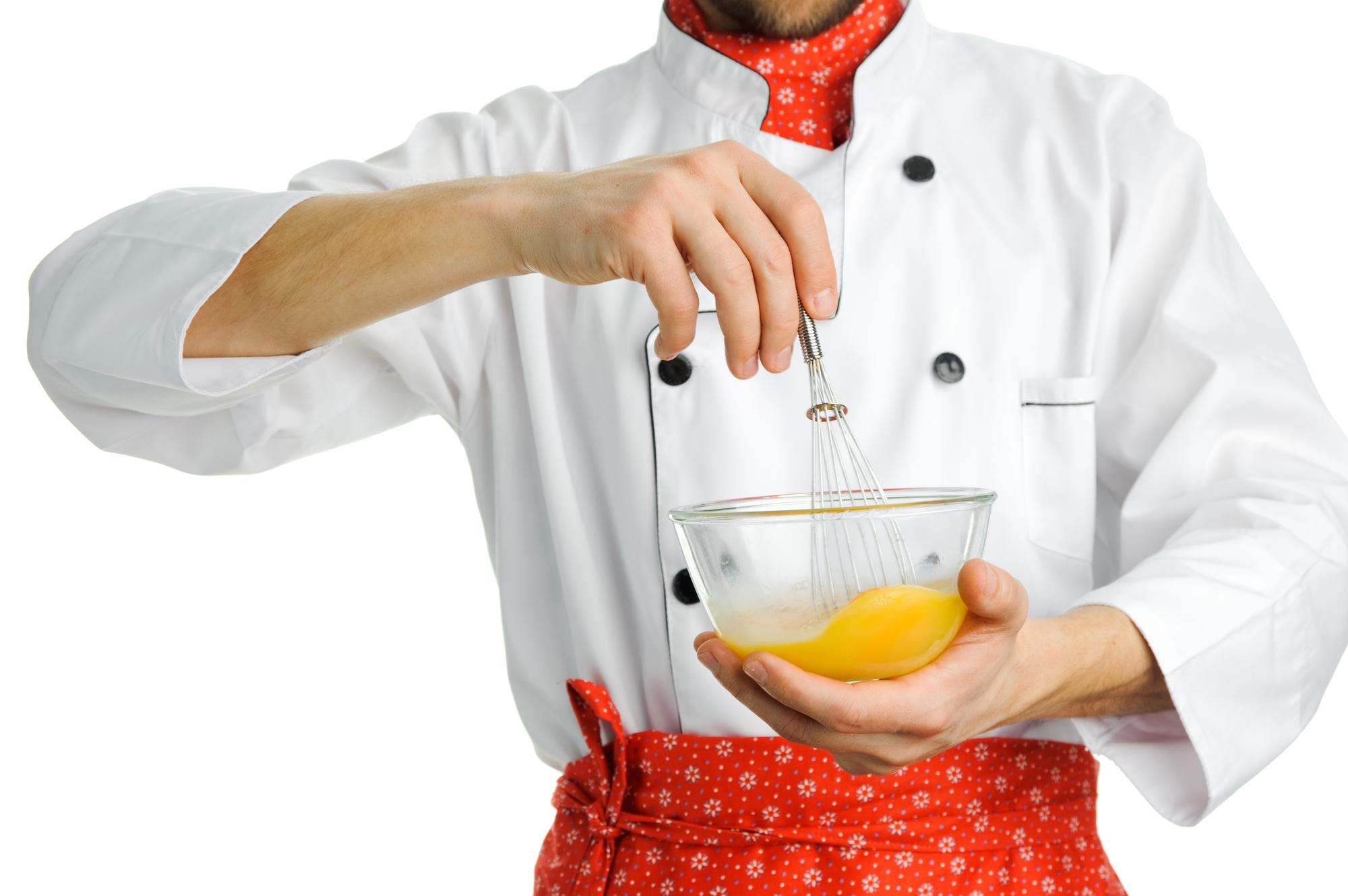 Chef using precise tech tools in modern kitchen